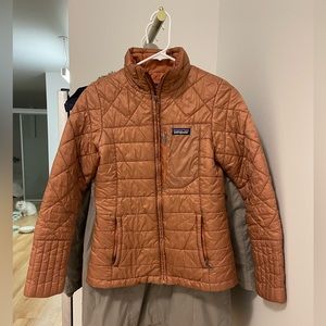 Used patagonia jacket size xa in women